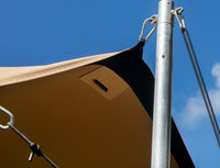 Close-up of stretch tent pole and tension strap connection