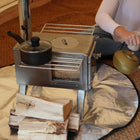 Round Bell Tent Sussex stove fire mat designed for heat protection inside bell tents, made of durable heat-resistant material.